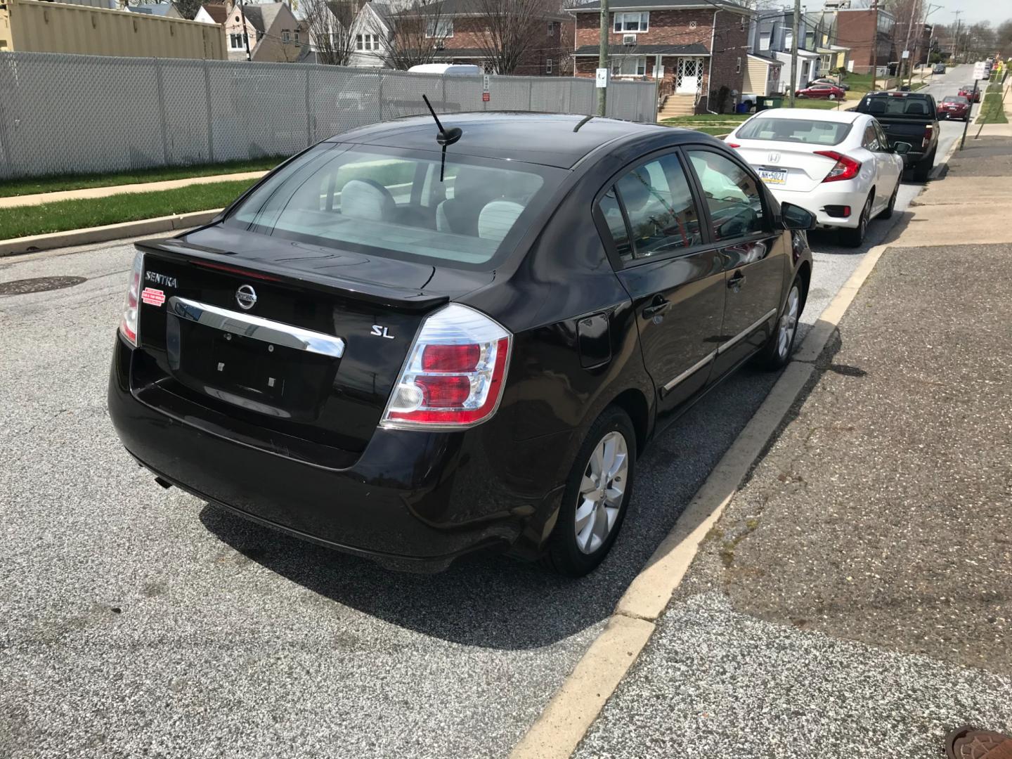 2011 Black /Gray Nissan Sentra SL (3N1AB6AP6BL) with an 2.0 engine, Automatic transmission, located at 577 Chester Pike, Prospect Park, PA, 19076, (610) 237-1015, 39.886154, -75.302338 - Photo#4